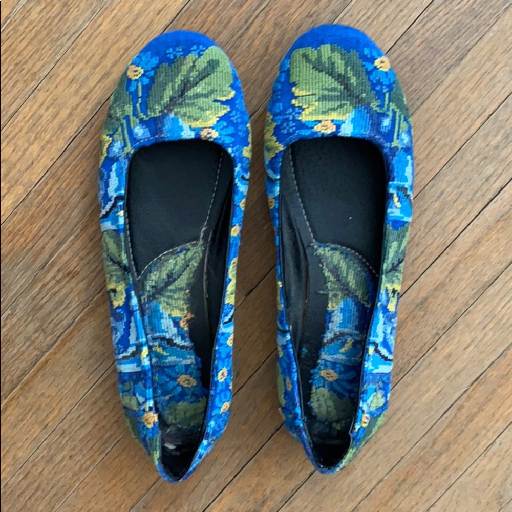 Never worn shoes with tapestry like floral print.
